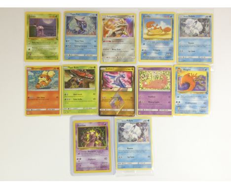 A collection of twelve Pokémon cards, all in plastic covers, to include : Vulpix (Toys R Us) x 2SlowpokeKinglerMewTwoKrabbyTa