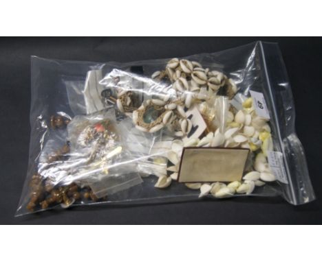 An assortment of gent's cufflinks and shell necklaces