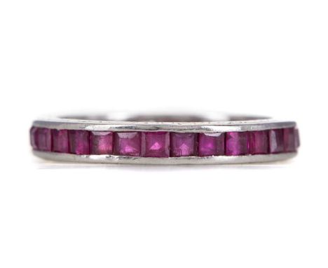 PARTIAL RUBY ETERNITY RING,one stone missing, marked PT to the edge, size L 1/2, 3.4g