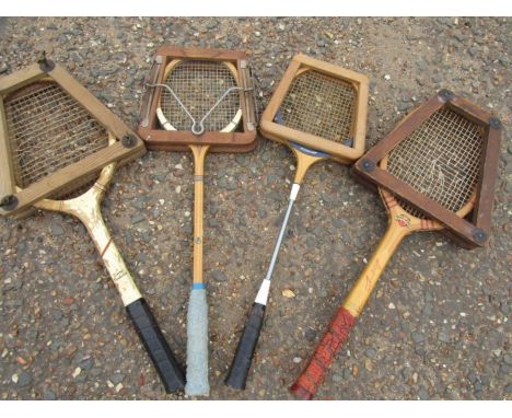 4 vintage rackets with press