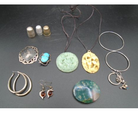 2 '925' sterling silver brooches, various earlings a few pairs, 3 thimbles and two oriental pendant necklaces one jade? and a