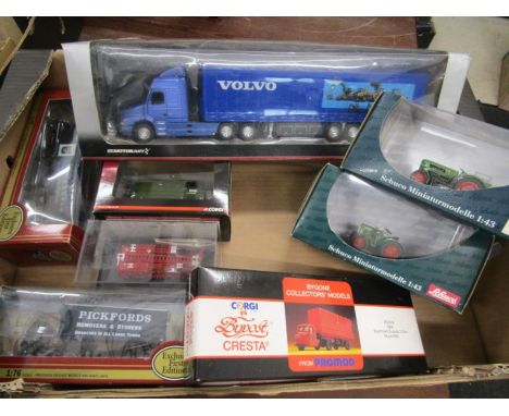 8 boxed diecast commercial vehicles to inc Motorart 150 scale Volvo arctic