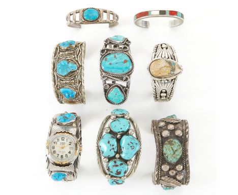 Group of eight Navajo Turquoise sterling silver cuff bracelets. One watch cuff signed "PA Sterling" for Patsy Allopowa (Zuni)