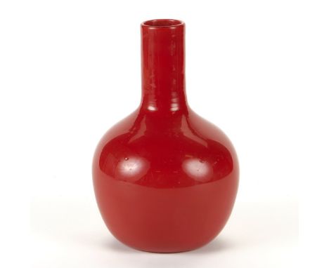 Venini Glass, Italy. Opaque red incamiciato glass bottle vase of the series "Cinesi" model 513.0 of the "catalogo verde." Wit