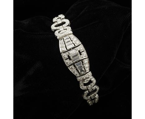 One women's platinum diamond bracelet. The bracelet is prong set with 153 round single cut diamonds, with one diamond missing