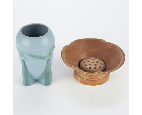 Roseville Pottery Company, United States. Group of two Arts &amp; Crafts pottery pieces, including one blue vase with an inve