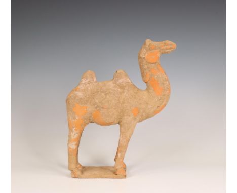 China, pottery model of a camel, probably Tang dynasty (618-906), standing foursquare on a plinth (damage and wear as expecte