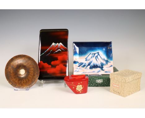 Japan, small collection of works of art, 20th century, comprising a lacquer writing box decorated with mount Fiji, an earthen