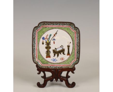 China, a Canton enamel pattipan, late Qing dynasty (1644-1912), decorated with censers and scholar's objects, on wood stand (