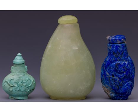 China, three various snuff bottles and stoppers, comprising a pebble-shaped jade bottle, a lapis lazuli bottle carved with a 