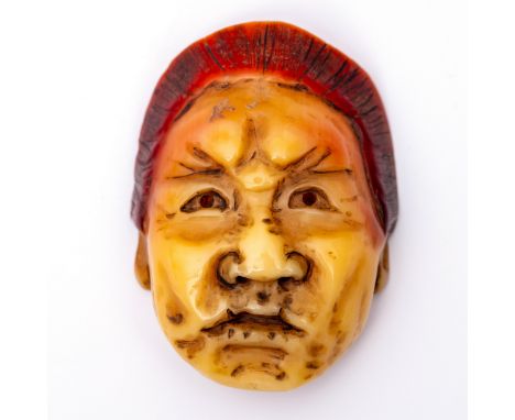 Japan, hornbill netsuke; Kyoken mask 5 x 4 cm. Uit de nalatenschap van Clemens Merkelbach van Enkhuizen [1]