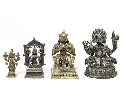 India, four various bronze deities, 19th-20th century; Garuda, Ganesha, Rama and a female Goddess. h. 9,5 / 10,5 / 8,5 and 6,
