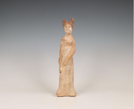 China, pottery model of a lady, probably Tang dynasty (618-906), the elegant lady standing wearing long robes and high headdr
