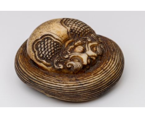 Japan, bone netsuke, Meiji period; Buddhist utensil and whisk. Signed Ko on mother of pearl plaque. With natural Himotoshi  d