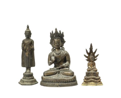 Thailand, a bronze figure of Buddha Muchalinda and a standing figure of Buddha and Sino-Tibet, a seated figure of Avalokitesh