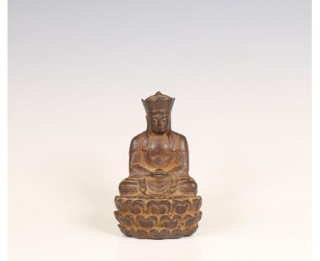 China, an iron statue of a seated Buddha, 18th/19th century; Seated on Lotus Throne. h. 12,5 cm [1]