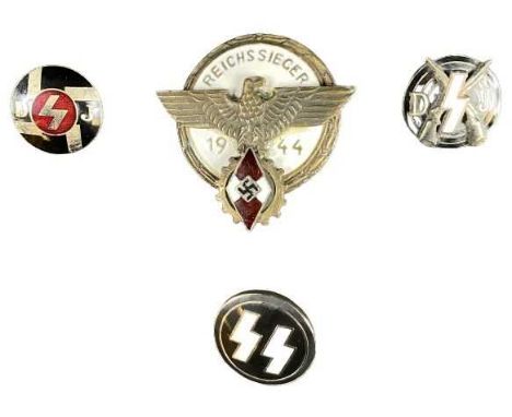 GERMAN THIRD REICH HITLER YOUTH &amp; SS BADGES - a group of four to include a 1944 enamelled Reichs Sesieger stamped 'G Breh