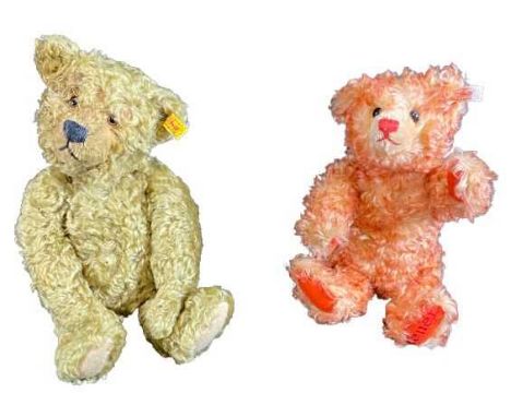 STEIFF BUTTON IN EAR TEDDY BEARS (2) to include Teddy Feuer in pink fur, No 01069 to a white tag having internal growler, 32c