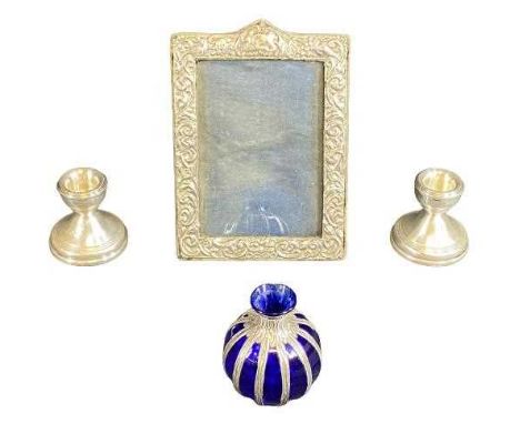 SILVER BIRMINGHAM 1903 REPOUSSE PORTRAIT FRAME - 18 x 13cms, a pair of Birmingham silver short stemmed candle holders and a w