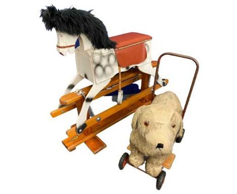 VINTAGE LEEWAY TRESTLE STAND ROCKING HORSE and a Deans Childsplay sit on/push along dog, 76cms H, 90cms overall L, 33cms W an