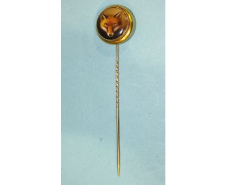 A Victorian stick pin with circular enamel plaque painted with a fox head, in plain gold mount, the back inscribed W Essex 18