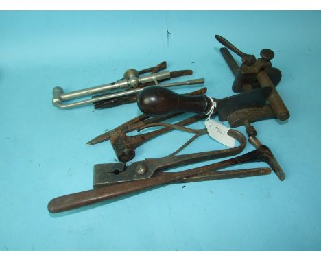 A vintage George Barnsley Saddlers/Cobblers leather plough gauge and other leather-work tools.