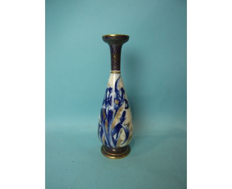 A Doulton ceramic baluster vase decorated with gilt and underglaze blue iris, 28cm high.