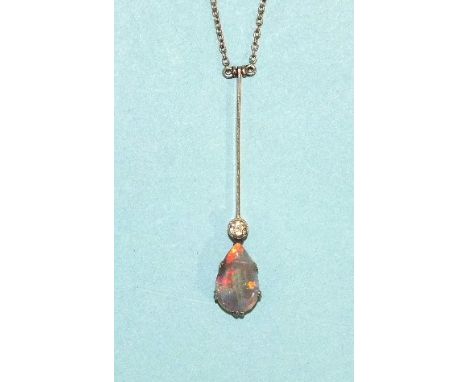 An Edwardian black opal and diamond necklace claw-set a pear-drop opal, below a millegrain-set brilliant-cut diamond, below k