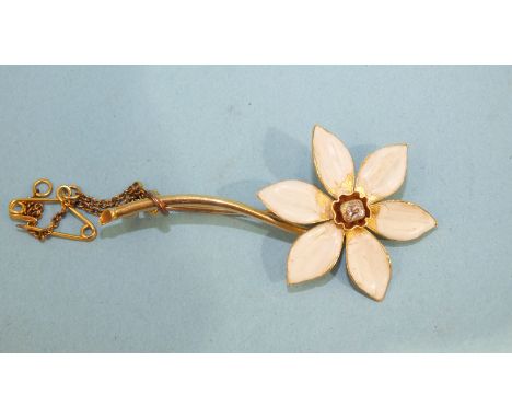 A yellow gold and enamel flower brooch with six white enamelled petals about a diamond centre, 49mm, 5.9g, (tested as 18ct go