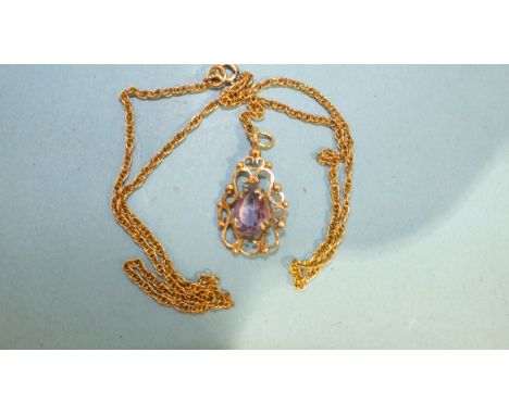 An amethyst-set 9ct gold pendant, on 9ct rope-twist chain, 4.1g.