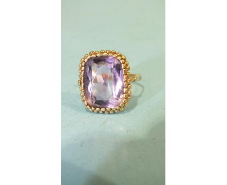 A large amethyst ring with 9ct gold shank, (split), size Q, 6.4g.