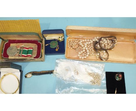 A gold-plated bangle, a Women's Voluntary Service medal, cased and boxed and other items.