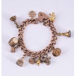 A CURB LINK CHARM BRACELET