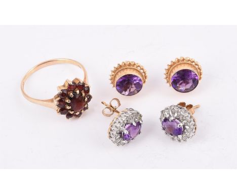 
	
		A SMALL GROUP OF JEWELLERY
		Comprising a pair of 9 carat gold oval cut amethyst and diamond point cluster earrings, UK 