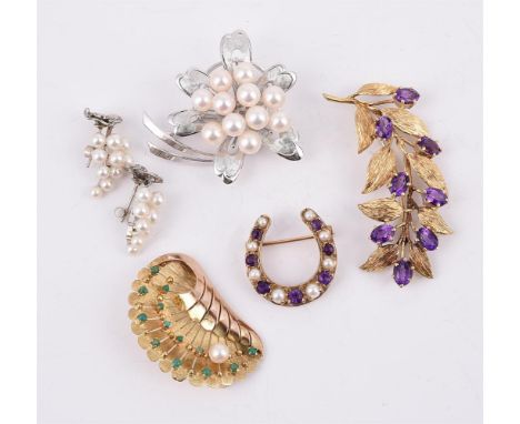 
	
		A SMALL COLLECTION OF BROOCHES
		Comprising an amethyst and cultured pearl set horse shoe brooch, London 1991; a 9 carat