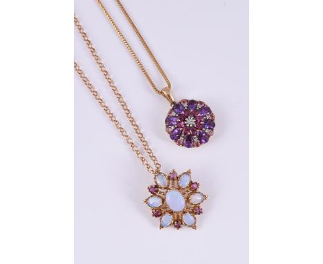 
	
		TWO GEM SET PENDANTS
		The first designed as an openwork cluster of oval cabochon opals and circular cut rubies , mounte