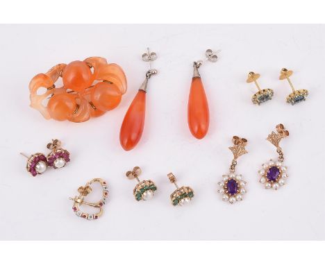 
	
		A COLLECTION OF EARRINGS 
		To include a pair of amethyst and half cultured pearl cluster drop ear pendants, with 9 cara