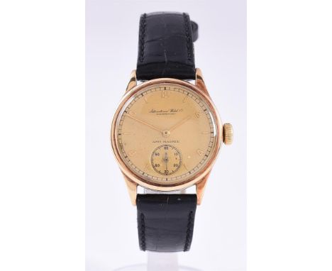 
	
		IWC
		A GOLD COLOURED WRISTWATCH, NO. 1012 25
		Movement: Cal. 83, manual wind
		Case: Gold coloured case, screw down ca