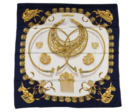 HERMÉS, LES CAVALIERS D'OR, A SILK SCARF  Designed by Vladimir Rybaltchenko, the white ground with navy borders, ochre tone d