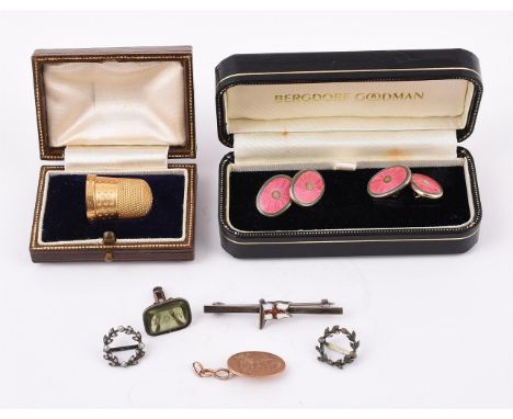 
	
		A SMALL GROUP OF JEWELLERY
		Comprising: a 9ct gold thimble engraved S.K. Mainwaring, Birmingham hallmark 1934; a pair o