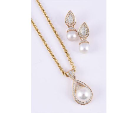 
	
		A CULTURED PEARL PENDANT NECKLACE AND EARRINGS
		The pendant set with a 14.2mm cultured pearl within a pear shaped surro