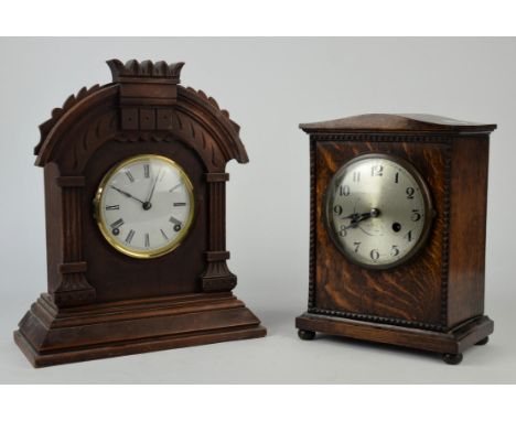 Oak mantle clock, with silvered metal dial, 29cm high,  and mahogany mantle clock, with an architectural cresting, 36cm high 