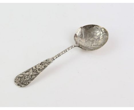 Oriental silver white metal tea caddy spoon with organic forms with stem decorated with flora, fauna and bird designs. 