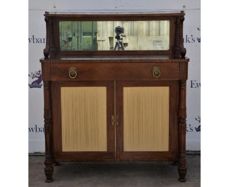 A William IV chiffonier, the superstructure with pierced brass gallery and shelf above mirror panel, flanked by leaf and reel