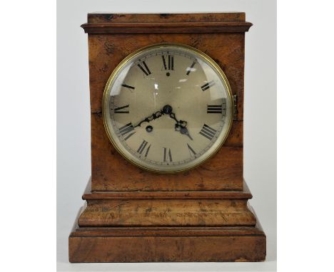Victorian walnut mantle clock the silvered dial with Roman numerals the two train movement striking the hours and half hours 