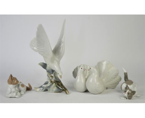 Group of four Lladro figures to include Turtle Dove, Couple of Doves, Attentive Cat and Surprised Cat, all boxed (4)Condition