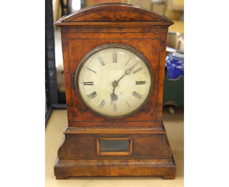 A Continental burr walnut mantel clock, 19th Century, with domed top, of architectural design, Roman numeral chapter ring, bo