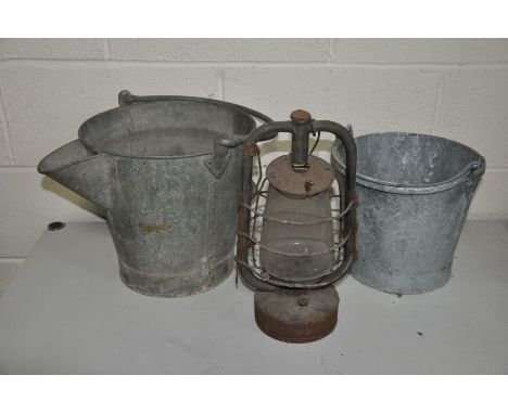 AN UNUSUAL SPOUTED GALVANISED BUCKET, diameter 31cm x height 32cm, a modern galvanised bucket and a vintage Tilley lamp (3)