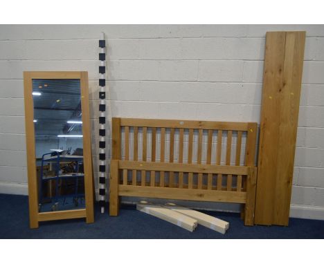 A LIGHT OAK 4' 6'' BEDFRAME, with side rails and slats, together with an oak full length mirror, on an A frame, width 65cm x 
