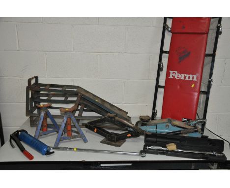 A QUANTITY OF AUTOMOTIVE TOOLS including a Ferm Crawler board, two jacks, Torque wrench, grease gun, axle stands, etc